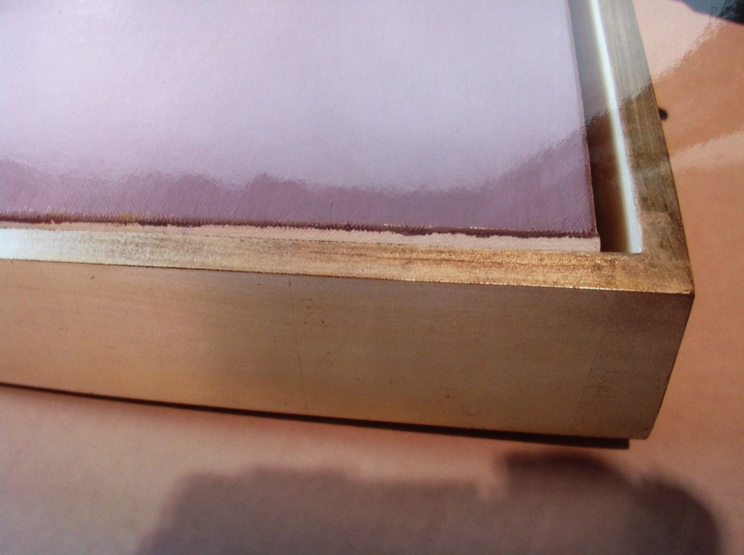 hand made in Maine custom canvas floater frame in 12 karat white gold leaf