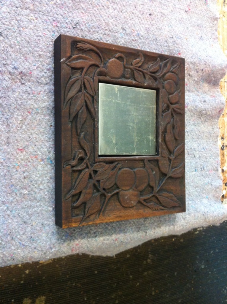 carved walnut frame